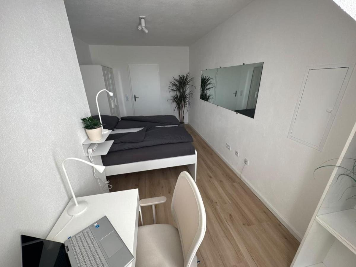 Bedroom with bed and desk